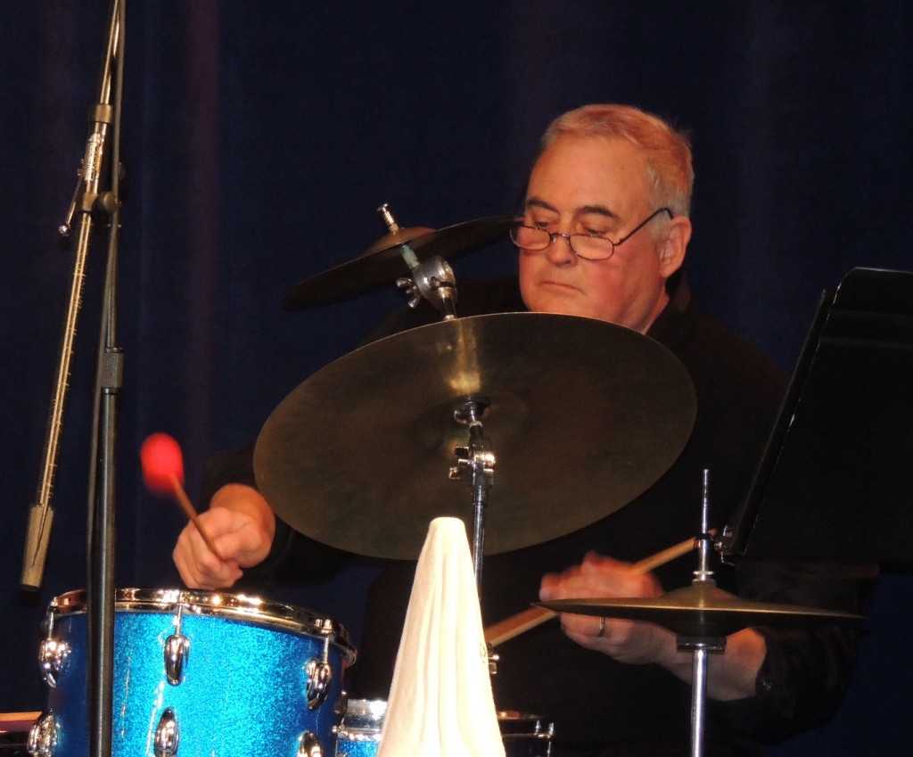 Reid Jorgenson playing with bongos