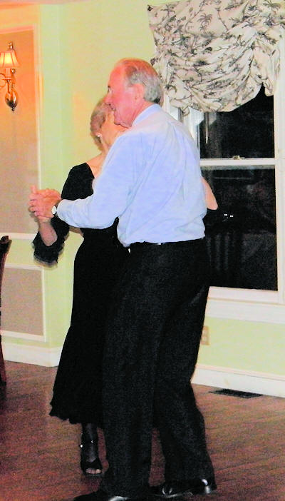 couple ballroom dancing together